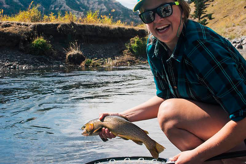 Young angler with trout