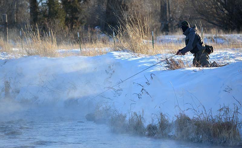 Fishing from snowbank