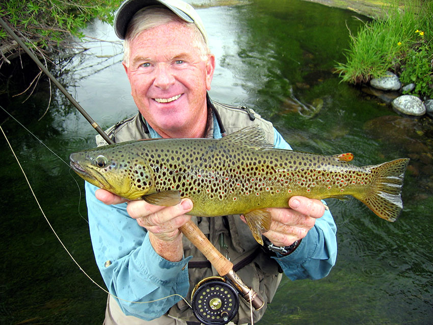 Angler with brown trout.